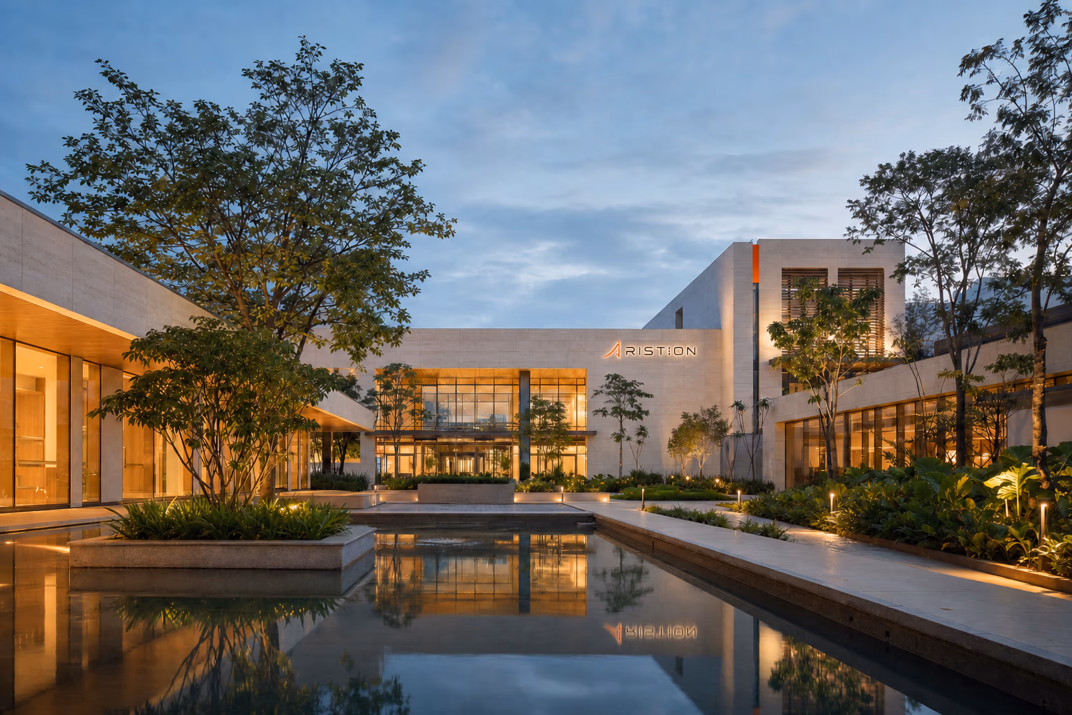 The first branded Aristion campus at dusk, conceived as a repeatable model for future cities.